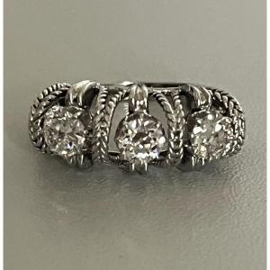 7175 - 1950s Platinum, White Gold, And Diamond Ring
