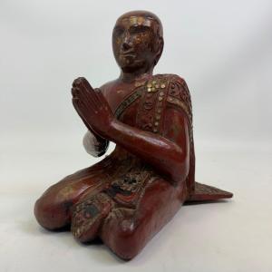 Lacquered Figure Of A Buddhist Devotee, With Glass Inlays