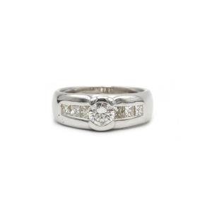 750 Gold Band Ring With Central Diamond 0.55 Ct Plus 6 Princess Diamonds Totaling 1.05 Carats 