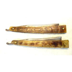 Pair Of English Razors In Pressed Horn.