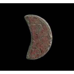 A Carolingian Lunula Fibula With Red Glass Paste, 875-1000ad