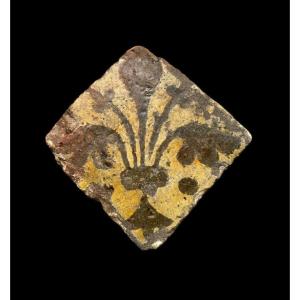 A Bright Yellow 'fleur-de-lis' Floor Tile, 14th Century