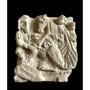 A French Fragment Of A Limestone Frieze With A Battle Scene, 12th-14th Century A.d.