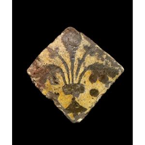 A Bright Yellow Early Floortile, ‘fleur-de-lis’, 14th Century