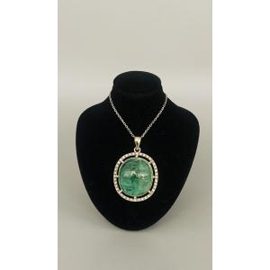 Pendant Set With A Cabochon Emerald And Diamonds