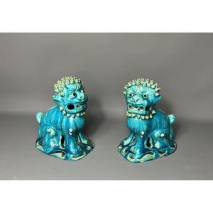 Pair Of Turquoise Glazed Ceramic Fo Lions