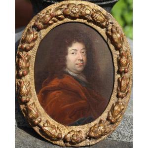 French School, Early 17th Century, Portrait Of A Man In A Red Coat, Oil On Panel, Oval View.