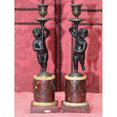 Pair Of Candlesticks, Putti Holding A Torchere, Late 18th Century