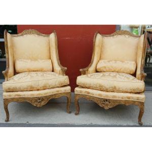 Pair Of Large Bergeres From The Regency Period With Ears In Golden And Carved Wood