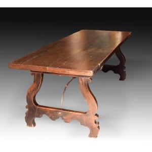 Walnut Wood Dining Table With Wrought Iron Fasteners. Spain, 20th Century.