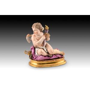 Cupid. Glazed Porcelain. Possibly Meissen, 19th Century.  