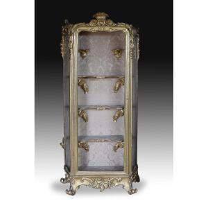 Louis XV Style Display Case. Polychrome And Gilded Wood, Textiles, And Glass. Late 19th Century.