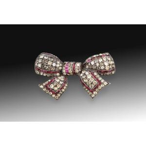 Bow-shaped Brooch. Silver, Rhinestones. Circa First Third Of The 20th Century. 