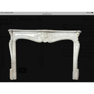 Louis XV Style Fireplace. In Carrara Marble
